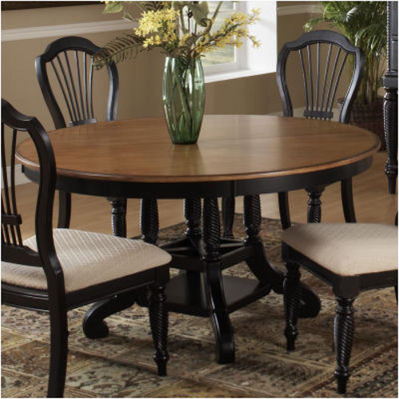 black round dining table with chairs