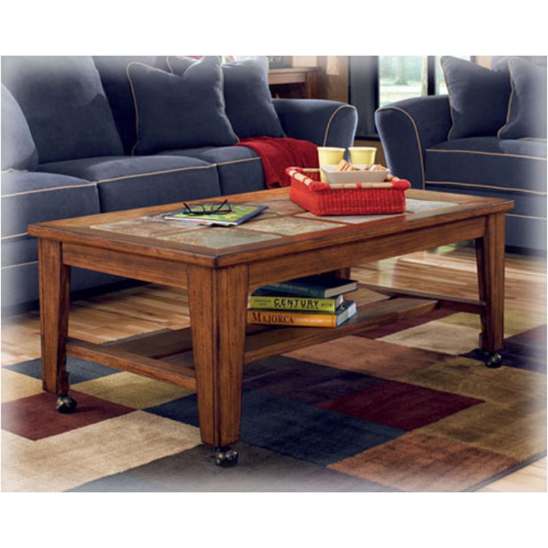 T353-0 Ashley Furniture Toscana - Rustic Brown Living Room Furniture Cocktail Table
