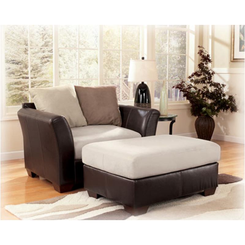 1940108 Ashley Furniture Logan - Stone Living Room Furniture Ottoman