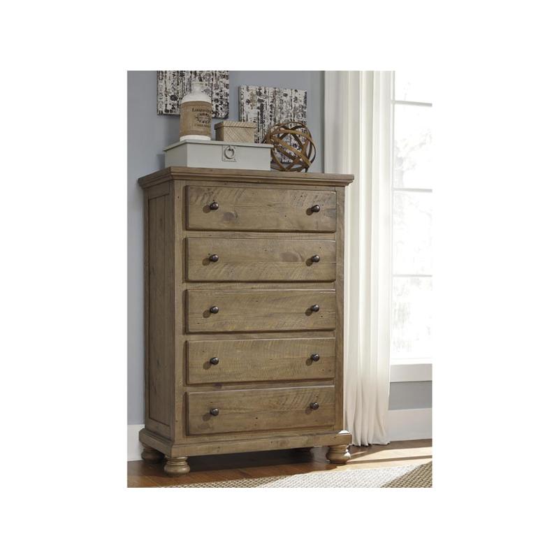 B65946 Ashley Furniture Trishley Light Brown Five Drawer Chest