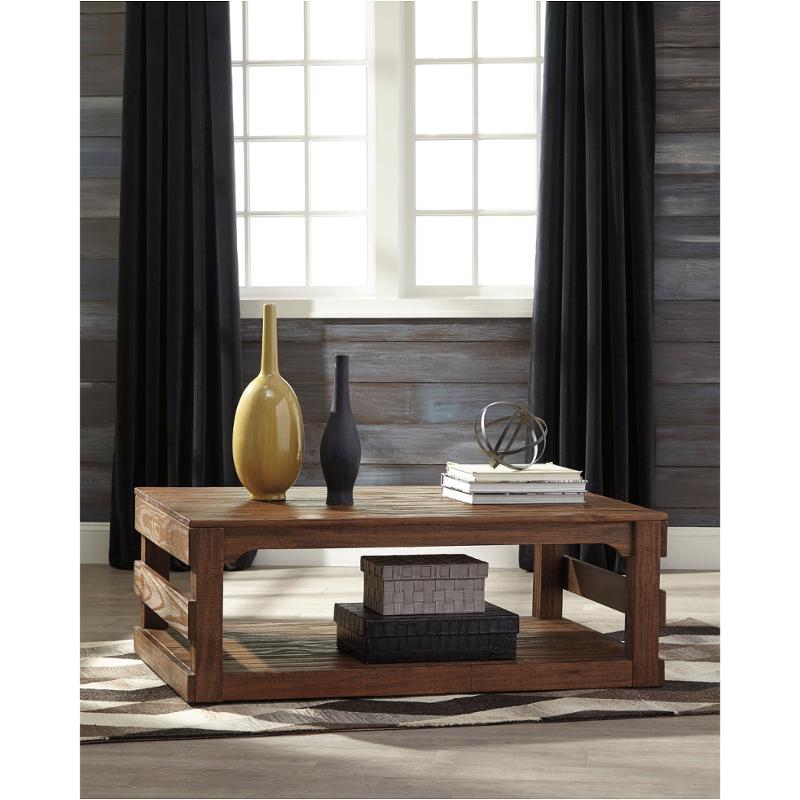 T795-1 Ashley Furniture Shanlore - Light Brown Living Room Furniture Cocktail Table